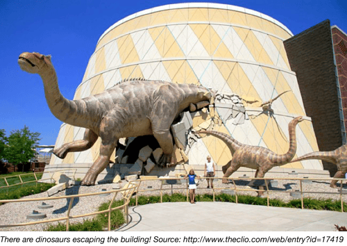 dinosaurs in front of a museum