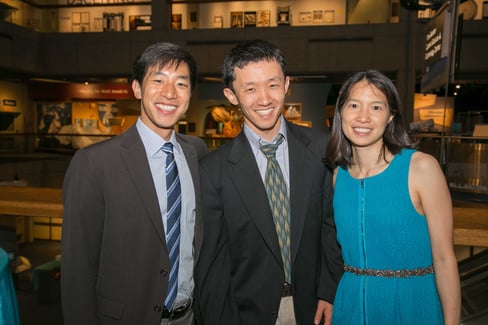 Addgene's founders in formalwear, smiling at the camera